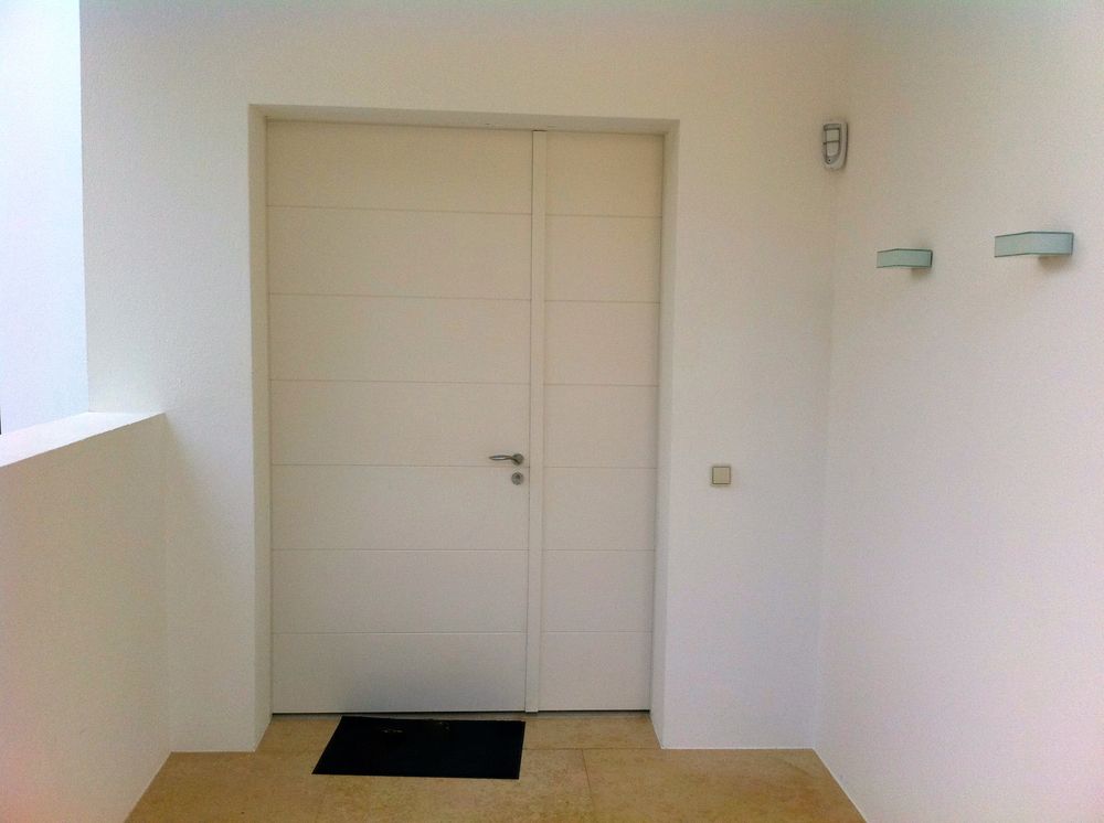 Porte d’entrée en acier fabriquée sur mesure